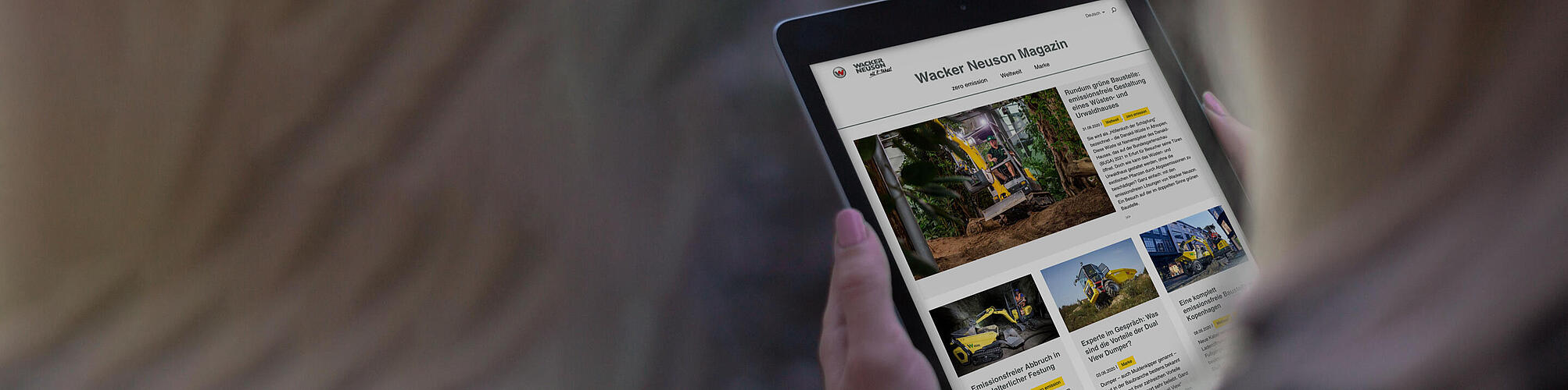 Wacker Neuson Online Magazine on a tablet.