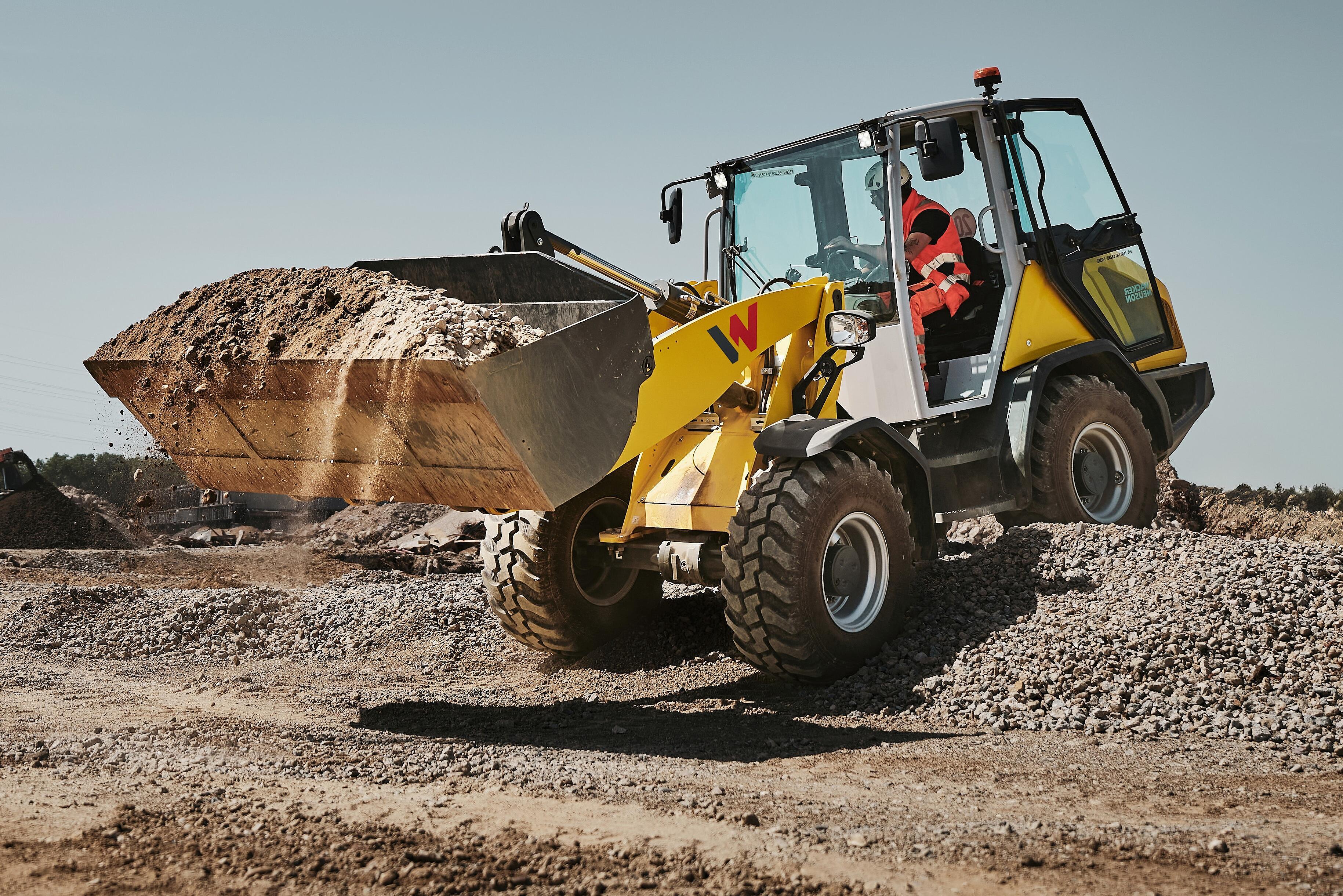yellow wheel loader WL1150 in action