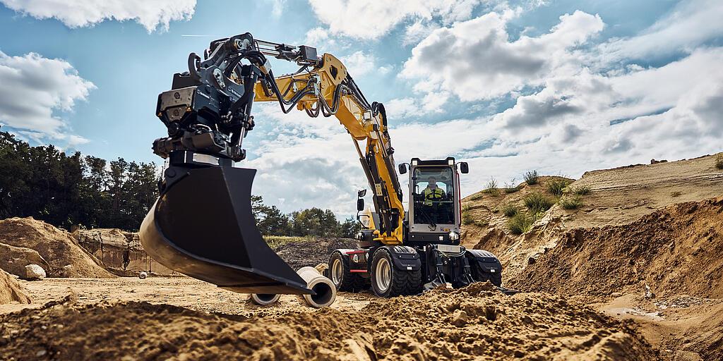 excavator EW100 in action