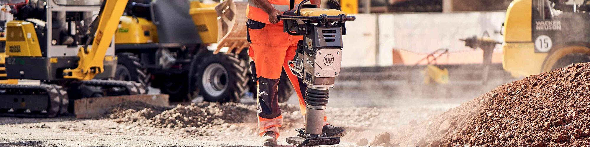 wacker neuson rammer in action at construction site