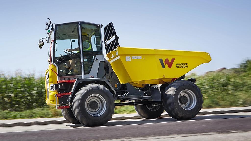 Dual View Dumper DV90 driving on a road.
