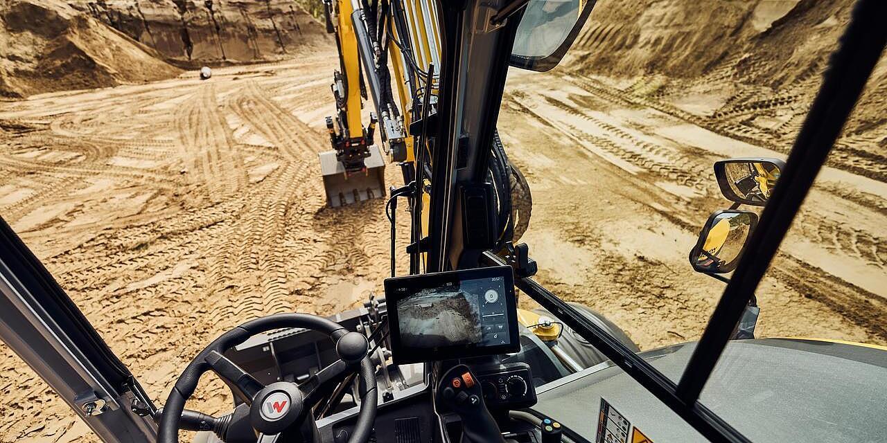 perspective from sitting inside an excavator