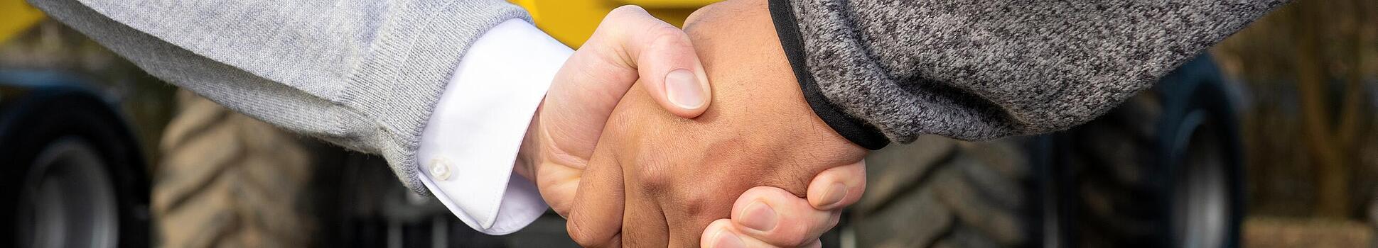 Handshake with new dealer